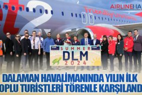 Dalaman Havalimanında yılın ilk toplu turistleri törenle karşılandı