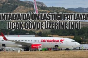 Antalya'da ön lastiği patlayan uçak gövde üzerine indi