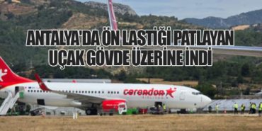 Antalya’da ön lastiği patlayan uçak gövde üzerine indi