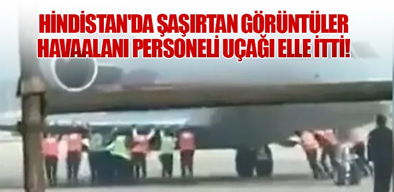 Hindistan'da Şaşırtan Görüntüler: Havaalanı Personeli Uçağı Elle İtti!